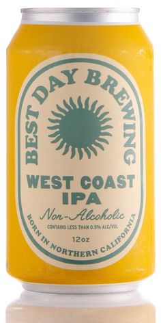 a can of beer with the label best day brewing west coast ipa on it's side