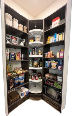 an open pantry with lots of food in it