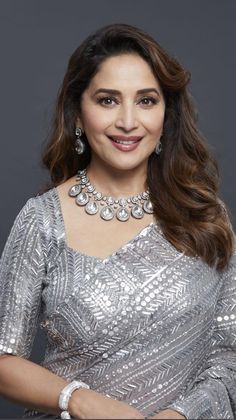 Madhuri Dixit Saree, Blue Blouse Designs, Texture Spray, Modern Saree, Layered Hairstyles, Stylish Short Dresses, Unique Blouse Designs, Embellished Blouse, Madhuri Dixit