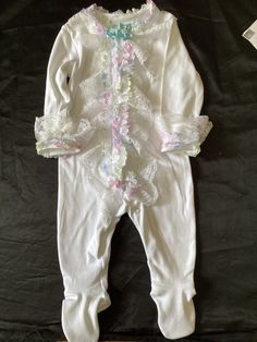 Beautiful Spanish style all in one Spring White Ruffled Onesie, White Spring Bodysuit For Bedtime, White Cotton Bodysuit For Bedtime, Spring Playtime Fitted Onesie, Spring Playtime Stretch Onesie, Spring Stretch Onesie For Playtime, Spring Playtime Onesie With Stretch, Spring Onesie For Playtime With Stretch, White Ruffled Onesie For Playtime