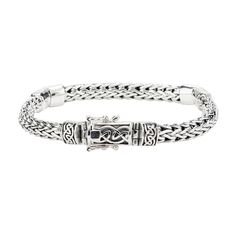 "Keith Jack Silver Dragon Weave 7.5\" Bracelet Made for Men & Women **Other sizes can be special ordered. Send us a direct message for inquiries** Celtic design in 925 sterling silver Closure: Tongue/Groove with figure \"8\" safety clasps Signifies life's continually evolving path Gift ready in Keith Jack gift box Complimentary polishing cloth Authentic Keith Jack Celtic Jewelry Design Signed by the artist About Keith Jack: Keith has spent his life submersed in every aspect of the Jewellery Classic Adjustable Bracelet With Intricate Design, Classic Sterling Silver Bangle With Intricate Design, Classic Adjustable Sterling Silver Bracelet With Intricate Design, Classic Sterling Silver Braided Bracelet With Engraving, Classic Engraved Sterling Silver Braided Bracelet, Celtic Bracelet, Celtic Design, Woven Bracelet, Silver Dragon