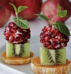 two pieces of fruit are sitting on bread