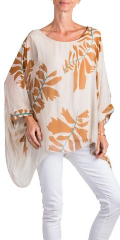 100% Silk Kaftan Style Blouse with Large Leaf Print. Features 3/4 Length Sleeves and a Wavy Bottom. Exterior: 100% Silk Interior: 95% Viscose, 5% Elastic Fits Sizes XS- XL Made in Italy Kaftan Style, Silk Kaftan, Style Blouse, Leaf Print, Leaf Prints, New Bag, Hot Pink, Length Sleeve, Bag Accessories