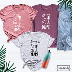 "21 and Legal Shirt, 21st Birthday Shirt, 21 Squad Shirt, Cheers to 21 Years Tee, 21 Birthday Party Shirt, 21st T-Shirt, Born in 1999 Shirt. Hello! Welcome to our store. Good to see you here. Our aim is to provide you with first class clothing at your best moments with our graphic t-shirts that we have designed or designed with your ideas. I am sure that you will like our designs for your family, friends and you. PRODUCT FEATURE: → Solid colors: %100 Cotton. → Heather colors: %52 Cotton + %48 Po 21 Birthday Party, Cheers To 21 Years, 21st Birthday Shirt, 21st Birthday Shirts, Squad Outfits, Class Outfit, 21 Birthday, Aunt Shirts, Bride Shirt