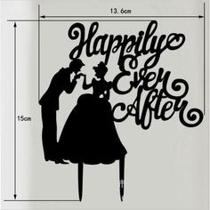 a cake topper with the words happily ever after and a silhouette of a man and woman