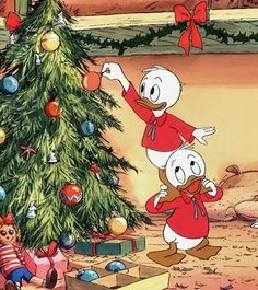 donald duck and friends around the christmas tree