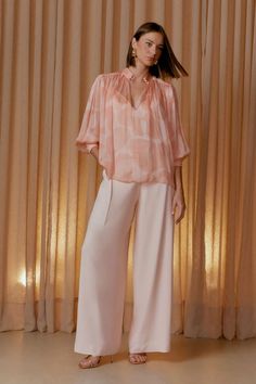 Exclusive Silk Blouse: Effortless Elegance with a Modern Twist Elevate your wardrobe with this exquisite blush silk blouse, designed to offer both luxury and sophistication. Soft Blush Tone In a delicate blush hue, this blouse embodies grace and elegance. The soft pink shade enhances natural beauty, making it perfect for any special occasion. Luxurious Pure Silk Crafted from pure silk, this blouse provides a sumptuous touch and a fluid drape that exudes both comfort and style. The silk’s subtle Blush Tones, Pink Shade, Jumpsuit Jacket, Sweatshirt Set, Scarf Headband, Dress With Cardigan, Skirt Top, Silk Blouse, Soft Pink