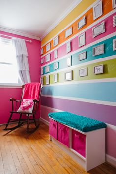 a brightly colored room with a rocking chair