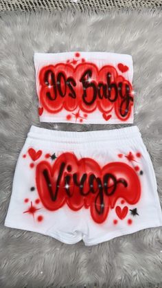 Designs by Galveston Airbrush! ♡ Feel free to contact me with any questions or custom orders. ✧ Our Designs on these cute Tube tops and shorts are handmade with the artists' skilled Hands and that makes each item unique ✧ Each design includes up to TWO names or words with up to THREE specified COLORS. SIZES: Available for ADULTS DESIGN PLACEMENT: All designs are airbrushed on the FRONT of our slim tube top and back of the shorts unless specified otherwise. International orders may have an additi Airbrush Photoshoot, Libra Szn, Tube Top And Shorts, Pink Bucket Hat, Airbrush T Shirts, Wife Beaters, 90s Clothing, Short Blanc, Cute Birthday Outfits