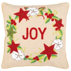 a christmas pillow with the word joy on it