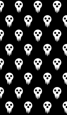 a black and white pattern with lots of ghost heads on the side, all in different sizes