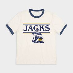 To match the vibes of this NAU Lumberjacks logo from the late 1980s, we incorporated retro ‘80s elements to this design. This specific Louie the Lumberjack was used as NAU’s primary logo until 2005; he saw the ‘Jacks through their NCAA men’s basketball tournament bid in 2000. Brought to you in partnership with College Vault. Products are mocked up on a size S. Graphics may appear smaller on larger sizes. Products are mocked up on a size S. Graphics may appear smaller on larger sizes. Vintage Graphic Print T-shirt For Fan Gear, 90s Graphic Print T-shirt For Fan Gear, 90s Style Graphic Print T-shirt For Fans, 90s Graphic Print Tops For Fan Gear, Retro Game Day T-shirt With Logo Print, Retro Logo Print T-shirt For Game Day, Retro Cotton T-shirt With Team Logo, Vintage Crew Neck Top With Team Logo, Vintage Screen Print Fan Gear Tops