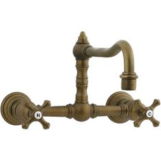 an antique style faucet with two handles