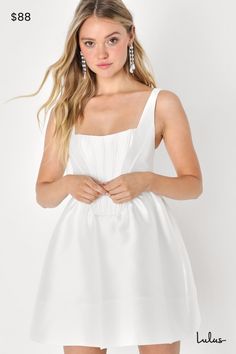 You'll always skip the line when you go out for the night in the Lulus Bubbly Love White Taffeta Corset Mini Dress! Structured taffeta, with a subtle sheen, provides perfectly flattering coverage as it shapes tank-style straps and a bustier-inspired bodice with supportive boning at the front. Skirt has a bubble-like, A-line silhouette and finishes at a flirty mini hem. Hidden zipper/clasp at back. Fit: This garment runs small - please size up. Length: Mid-thigh. Size medium measures 32.5" from s Satin A-line Mini Dress With Ruched Bodice, Satin A-line Mini Dress With Lined Bodice, Elegant Taffeta Mini Dress For Prom, Flirty Satin Dress For Wedding, Satin Dress With Sweetheart Neckline And Lining, Flirty Satin Dress With Lined Bodice, Elegant Taffeta Corset Dress For Prom, Fitted Taffeta Mini Dress For Prom, Spring Prom Satin Dress With Ruched Bodice