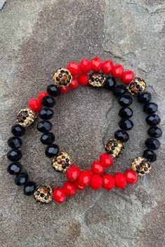 Set of 2 Red & Black Elastic Beaded Bracelets Featuring Studded Leopard Style Bead Accents Imported Circumference 6" Red And Black Bracelets Beads, Red Stretch Bracelet With Black Beads, Red Bracelets With Black Round Beads, Red Bracelets With Large Beads For Party, Red Large Beads Bracelets For Party, Red And Black Bracelets, Elastic Beaded Bracelets, Bead Things, Girls Bracelets