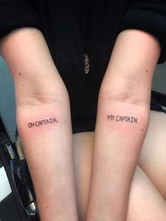 two people with matching tattoos on their arms that say, my captain and my captain