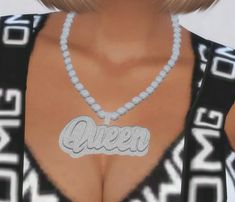 a woman wearing a necklace with the word queen on it