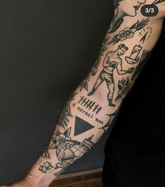 a man's arm with tattoos on it