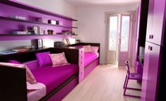 a living room with purple furniture and white walls in the background is an instagram page