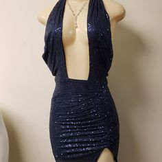 Blue Sequins Dress New With Out Tag True To Size Mannequin Has On A Xs..But It Fits Like A Small Material Is Polyester This Dress Do Stretch But The Xs Will Fit Size 5/6..7/8...I Have Size 2x In Stock Also Royal Blue Backless Dress For Night Out, Blue Backless Dresses For Party Season, Blue Backless Club Dress, Blue Backless Mini Dress For Evening, Blue Sequined Backless Mini Dress, Blue Mini Dress For Night Out, Glamorous Blue Mini Dress For Evening, Blue Denim Mini Dress For Night Out, Glamorous Blue V-neck Mini Dress