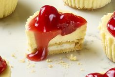 there is a piece of cheesecake with jelly on it