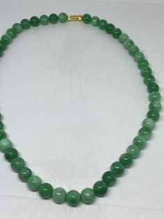 vintage Jade beaded 16 inch necklace graduated Gorgeous and delicate hand polished fun Jade Stone Color enhanced All jewelry is shipped free in the US in a nice gift box. Check out our over a THOUSAND great reviews Jade Beaded Single Strand Necklace Gift, Jade Single Strand Beaded Necklace Gift, Single Strand Jade Beaded Necklaces As Gift, Jade Bead Necklace For Gifts, Jade Necklaces With Round Beads For Gifts, Jade Necklace With Round Beads For Gifts, Vintage Necklace With Round Beads For Gifts, Round Beads For Costume Jewelry Gifts, Gift Round Beads For Costume Jewelry