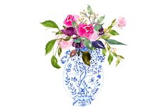 a blue and white vase filled with lots of flowers