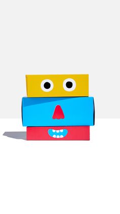 an image of a cardboard box with eyes and mouth