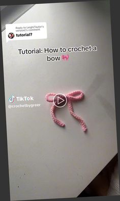 a pink crochet monkey on top of a white box with the words how to crochet below it