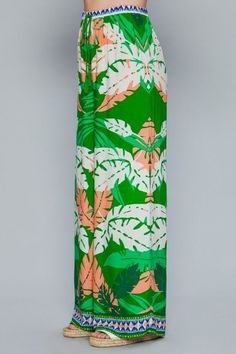 Feel absolutely chic in our cute green leaf print surplice kimono wide pant. A perfect piece for a fabulous vacation and beach outfit. High waist Print detail Waist band has adjustable string Wide leg Fabric: 100% Cotton Matching top with IT10484FN Green Hawaiian Summer Bottoms, Chic Green Maxi Length Bottoms, Green Floral Print Beachwear Bottoms, Green Floral Beachwear Bottoms, Green Maxi Length Bottoms For Spring, Green Bottoms For Vacation, Green Printed Beach Bottoms, Green Floral Print Beach Bottoms, Green Printed Bottoms For Vacation