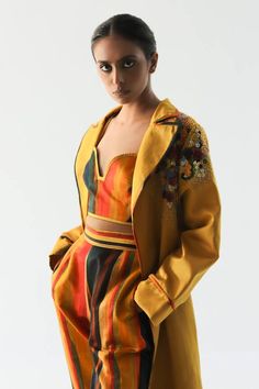 Mustard impasto trench in pure cotton silk satin, features multi colored floral hand embroidery. - Aza Fashions Floral Hand Embroidery, Satin Hands, Women Jackets, Fashion App, Cotton Silk, Aza Fashion, Silk Satin, Multi Colored, Hand Embroidered