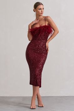 Prepare to be the topic on everyones minds at your next event in this aptly-named midi, In Your Head. Crafted in eye-catching sequins that sparkle as you move, this plum dress is defined by an artful array of feathers that frames its neckline. For an alluring wedding guest look, try styling In Your Head with some statement earrings and a tousled bun. Features - Premium fluffy sequin- Bodycon fit - Adjustable cami straps- Feather neckline- Invisible zip closure - Split hemline - Midi length Sizing & Fit Model is 5'8 and wears UK size 8 / US size 4 Product Information Designed exclusively by Club L London Fully lined with some stretch Premium fluffy sequin & feathers in Plum (95% Polyester, 5% Elastane) Trim: 100% real feathers125cm total length SKU: CL129925112 Product CareTo prolong the li Dress With Feathers, Midi Bridesmaid Dress, Plum Dress, Strappy Midi Dress, Black Dress Prom, Midi Dress Style, Black Tie Gala, Wedding Guest Looks, Christmas Party Dress