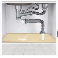 an image of a sink with pipes coming out of it