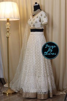 Check out this item in my Etsy shop https://www.etsy.com/listing/1279481661/white-chikankari-lehenga Cream Lace Work Sets For Reception, Cream Floor-length Sets With Intricate Embroidery, White Gown With Resham Embroidery For Ceremony, Off White Chikankari Embroidery Sets For Reception, White Gown With Zari Work For Ceremony, Cream Resham Embroidery Set For Ceremony, Cream Anarkali Set With Lace Work, Cream Semi-stitched Gown With Pallu, White Gown With Dupatta For Ceremony