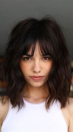 30 Stylish Shoulder Length Haircuts To Try Now : Undone , Effortless Long Bob I Take You | Wedding Readings | Wedding Ideas | Wedding Dresses | Wedding Theme Dark Fringe Hairstyles, Dark Brown Long Bob With Bangs, Dark Brown Shaggy Bob, Shoulder Length Hair And Fringe, Dark Medium Hair With Bangs, Black Lob With Bangs, Dark Brown Edgy Hair, Chocolate Brown Bob Haircut With Bangs, Short Dark Hair With Fringe