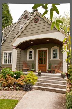 a house with steps leading to the front door