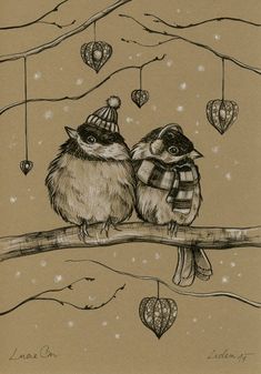 two birds sitting on a tree branch wearing hats