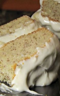 a close up of a cake with frosting on a plate