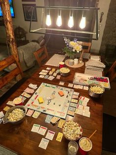 a wooden table topped with lots of food