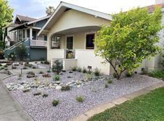 a house with landscaping in front of it