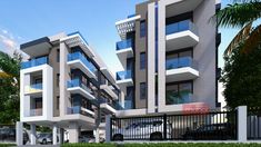 an apartment building with balconies and balconies on the second floor is shown