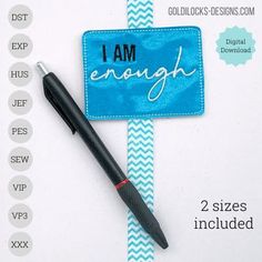 i am enough bookmark with pen on it and blue chevron ribbon next to it