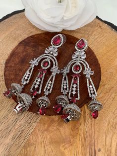 AD Wine Red Chandelier Silver Polish Earrings Formal Red Chandelier Earrings, Red Chandelier Earrings For Formal Events, Red Dangle Bridal Earrings, Red Ruby Dangle Chandelier Earrings, Traditional Red Chandelier Drop Earrings, Red Danglers For Party, Ruby Chandelier Drop Earrings For Party, Red Ruby Danglers, Celebration Red Ruby Danglers