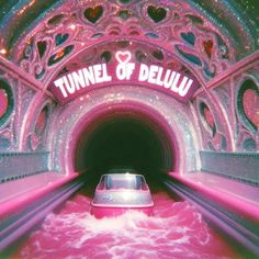 the tunnel of deluxu is pink and white with hearts on it's side