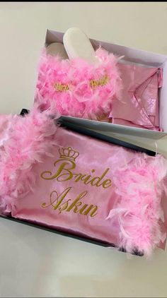 Treat yourself or a loved one to this luxurious pink personalized dressing gown, suspender dress, and slippers set, beautifully packaged in a special box. Perfect for adding a touch of elegance and comfort to your loungewear collection. 🎁✨ Includes a pink personalized dressing gown, suspender dress, and slippers Custom embroidered with a name or initials Made from high-quality, soft, and comfortable fabric Presented in a beautifully designed special gift box Ideal for special occasions or as a thoughtful gift Elegant Pink Gift Sets, Luxury Gift Set, African Lace Dresses, Pink Collection, African Lace, Lace Dresses, Suspender Dress, Dressing Gown, Bridesmaids Gifts