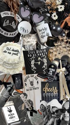 a table topped with lots of black and white party decorations on top of each other