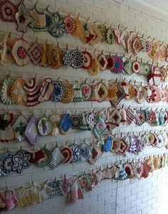 the wall is covered with many different pieces of cloth