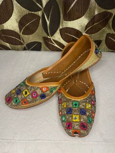 Traditional, handmade Punjabi jutti for women. Festive Mirror Work Flats, Festive Zari Work Flats For Summer, Navratri Flats With Dori Work, Festive Multicolor Gota Work Flats, Handwork Flats For Festive Summer Occasions, Bohemian Flats With Zari Work, Multicolor Flat Shoes For Festive Occasions, Bohemian Flats For Festive Season, Festive Flats For Festivals