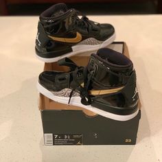 Nike Kid's Jordan Legacy 312 'Black Metallic Gold' Black/Gold Sz 7 At4040-007 Black High-top Jordan Shoes, Black High-top Synthetic Jordan Shoes, Black High-top Jordan Shoes Synthetic, Black Synthetic High-top Jordan Shoes, Black Custom Sneakers With Branded Insole, Jordan Legacy 312, Shoes Jordan, Jordan Black, Kids Jordans