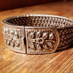 1" Tall Solid 66 Grams Bracelet With A Floral Repousse Clasp. 1/4" Thick & Tightly Braided "Somerset Mesh" Type Band That Is Approx 8" When Closed. Artisan Unsigned....Believed To Be Morrocan. Marked 925. Beautiful....Just A Side Note, Sterling Does Not Tarnish When You Where It! Silver Braided Bracelet, Braided Bracelets, Womens Jewelry Bracelets, Braids, Women Jewelry, Band, Sterling Silver, Floral, Silver